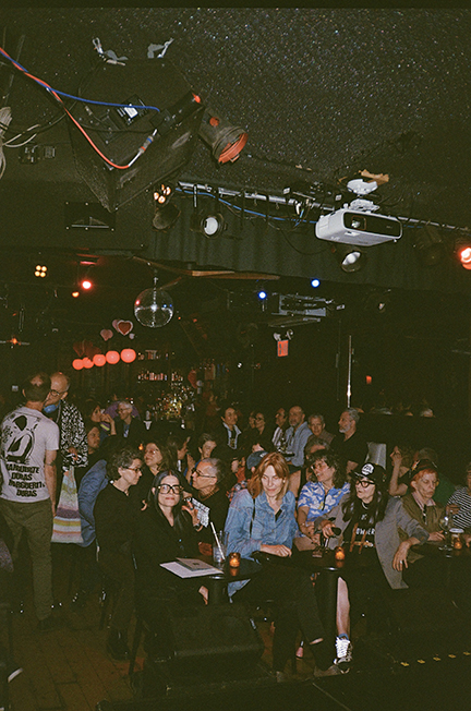 Photo of audience at the Parkside Lounge in NYC for screening of videos by Cecilia Dougherty