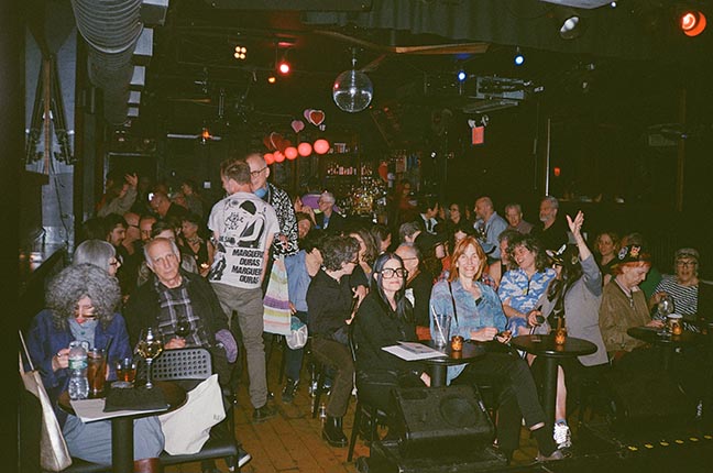 Photo of audience at the Parkside Lounge in NYC for screening of videos by Cecilia Dougherty